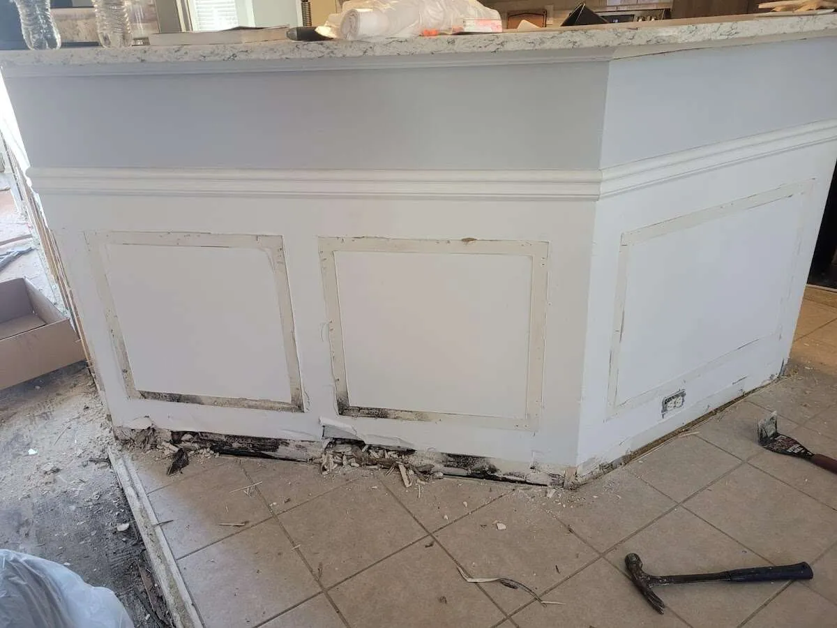 Water damage and mold on kitchen during Storm Damage Restoration in Auburn